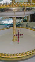 Load and play video in Gallery viewer, Hermès Fire Cross Necklace
