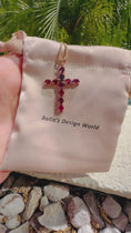 Load and play video in Gallery viewer, Hermès Fire Cross Necklace
